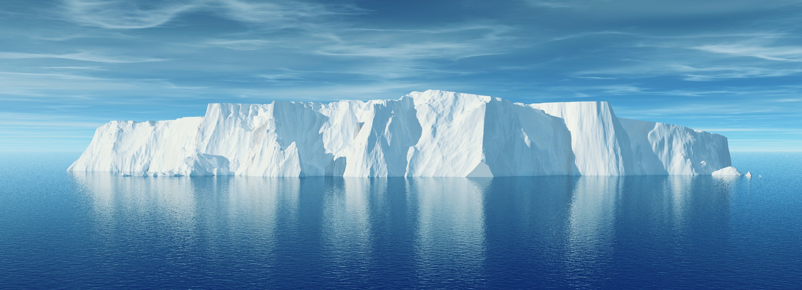 View of iceberg with beautiful transparent sea on background.